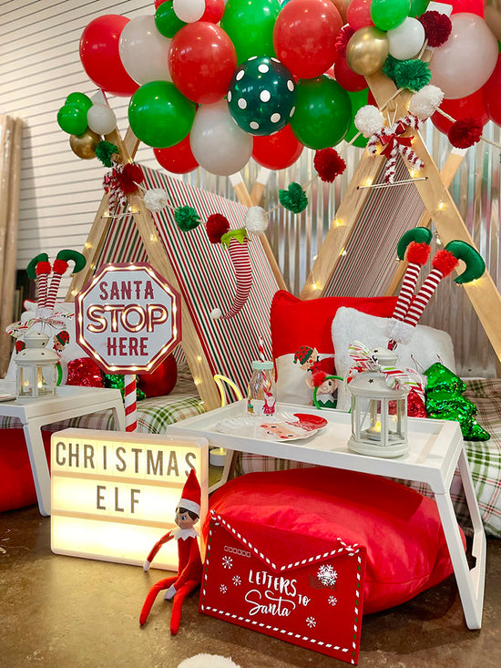Elf themed Christmas tent party