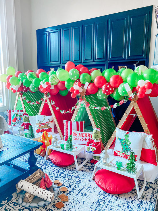 Grinch themed tent party for the holiday season